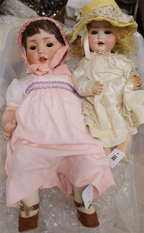 A Schoenau & Hoffmeister PB in a star B8 bisque head doll and another German bisque head doll PM 914/9